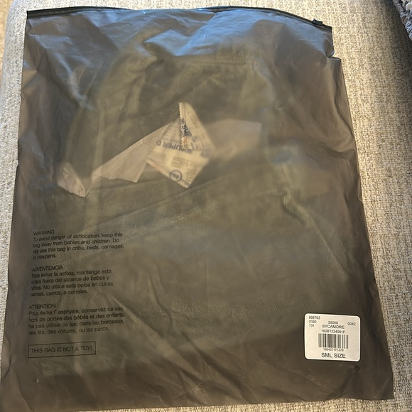 Fear of God Essentials Terry Short
Color: Sycamore. NWT size small - Picture 3 of 4